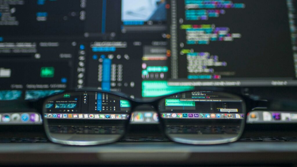 Closeup photo of eyeglasses – Analyzing Cloudflare’s 2026 Founders’ Letter: Web Traffic Shift, AI Agent Economics, and Infrastructure Overhead